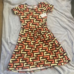 NWT Lularoe Amelia large dress with a geometric pattern.
